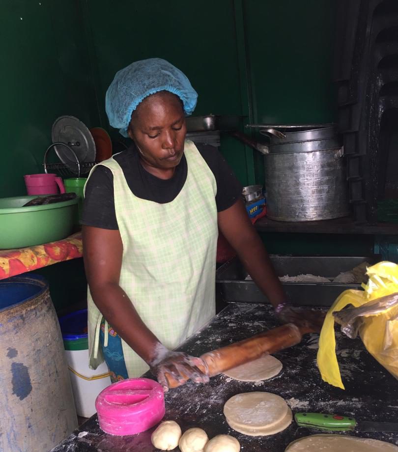 Woman cooking in the camps